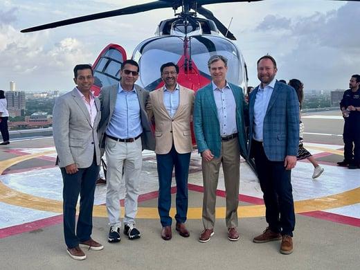 Longitude Health executives on the helipad of Memorial Hermann Life Flight.
